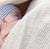 Child in nesting days carrier